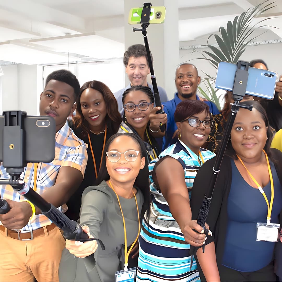 Journalists with their mobiles during Dan Mason's training in Barbados, Eastern Caribbean